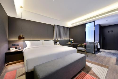 Imagen general del Hotel Mehood Lestie, Qujiang Dayan Pagoda Datang Everlasting City Jinhui Plaza. Foto 2