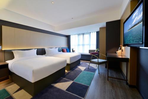 Imagen general del Hotel Mehood Lestie, Qujiang Dayan Pagoda Datang Everlasting City Jinhui Plaza. Foto 6