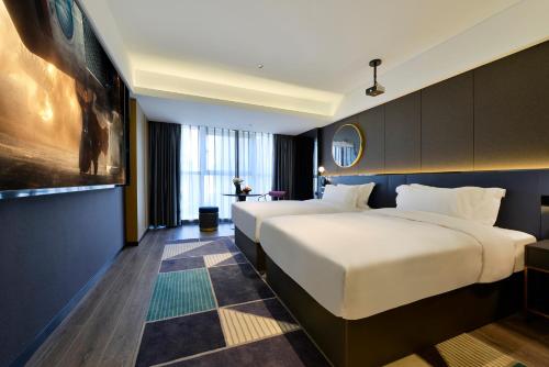 Imagen general del Hotel Mehood Lestie, Qujiang Dayan Pagoda Datang Everlasting City Jinhui Plaza. Foto 7