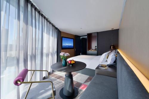 Imagen general del Hotel Mehood Lestie, Qujiang Dayan Pagoda Datang Everlasting City Jinhui Plaza. Foto 9