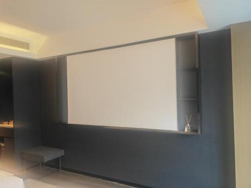 Imagen de la habitación del Hotel Mehood Lestie, Qujiang Dayan Pagoda Datang Everlasting City Jinhui Plaza. Foto 15