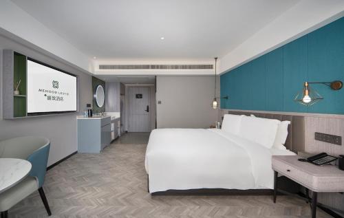Imagen de la habitación del Hotel Mehood Lestie, Taizhou Pozi Street. Foto 13