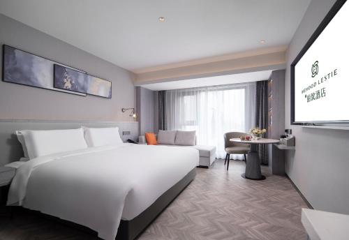 Imagen de la habitación del Hotel Mehood Lestie, Taizhou Pozi Street. Foto 15