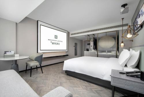 Imagen de la habitación del Hotel Mehood Lestie, Taizhou Pozi Street. Foto 16