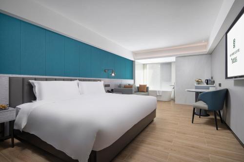 Imagen de la habitación del Hotel Mehood Lestie, Taizhou Pozi Street. Foto 19