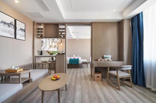 Imagen de la habitación del Hotel Mehood Lestie, Tianjin Changhong Park. Foto 15