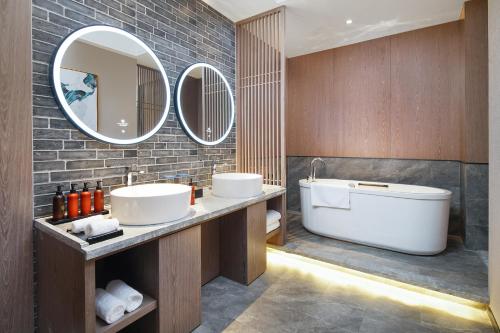 Imagen general del Hotel Mehood Lestie, Tianjin Changhong Park. Foto 12