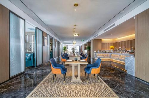 Imagen general del Hotel Mehood Lestie, Tianjin Meijiang Convention and Exhibition Center Flagship Store. Foto 4