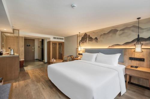 Imagen de la habitación del Hotel Mehood Lestie, Xiamen Zhongshan Road Pedestrian Street. Foto 12
