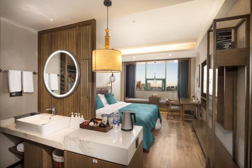 Imagen de la habitación del Hotel Mehood Lestie, Zhangbaliu Road, Xi\'an High-tech Zone. Foto 11