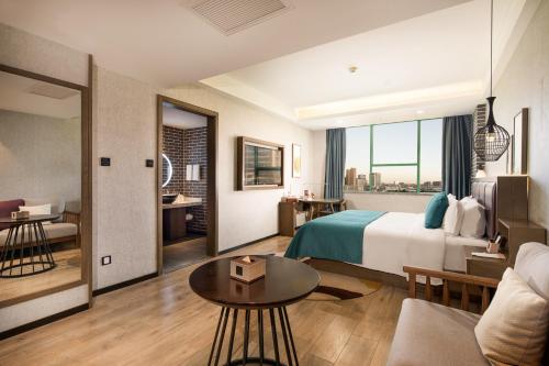 Imagen de la habitación del Hotel Mehood Lestie, Zhangbaliu Road, Xi\'an High-tech Zone. Foto 12