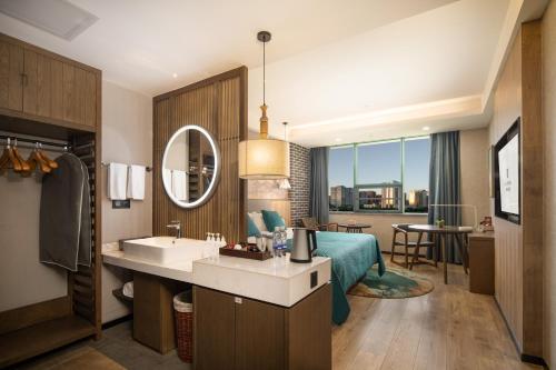 Imagen de la habitación del Hotel Mehood Lestie, Zhangbaliu Road, Xi\'an High-tech Zone. Foto 13