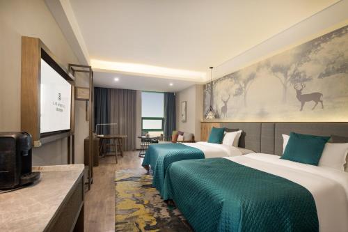 Imagen de la habitación del Hotel Mehood Lestie, Zhangbaliu Road, Xi\'an High-tech Zone. Foto 19