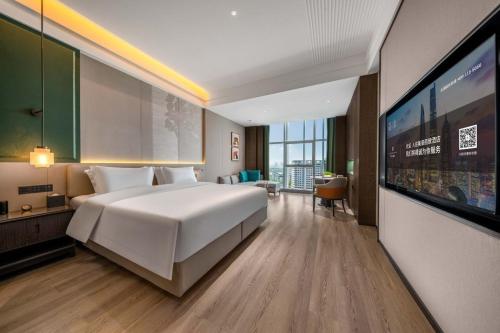 Imagen general del Hotel Mehood Lestie, Zhengzhou East Railway Station Beilong Lake Flagship. Foto 3