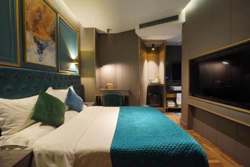 Imagen de la habitación del Hotel Mehood Shanghai Lujiazui. Foto 14