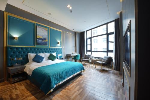 Imagen de la habitación del Hotel Mehood Shanghai Lujiazui. Foto 15