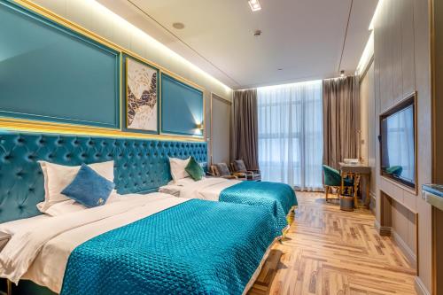 Imagen de la habitación del Hotel Mehood Shanghai Lujiazui. Foto 16