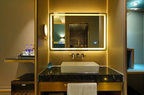 Imagen de la habitación del Hotel Mehood Shanghai Lujiazui. Foto 17