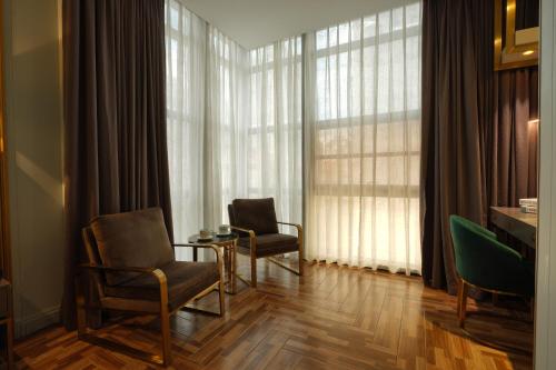 Imagen de la habitación del Hotel Mehood Shanghai Lujiazui. Foto 19