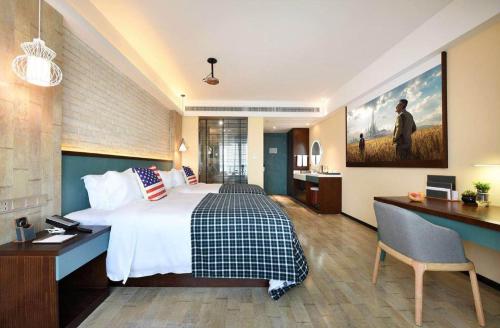 Imagen de la habitación del Hotel Mehood Theater, Jinan High -tech Zone Wanda Plaza. Foto 15