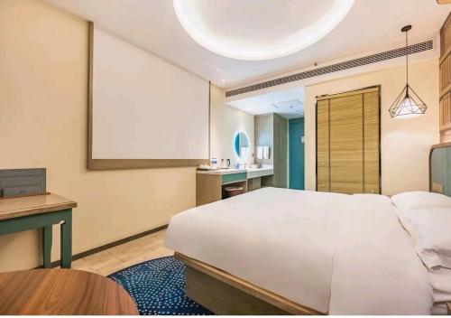 Imagen de la habitación del Hotel Mehood Theater, Zhonglou Metro Station Huimin Street. Foto 16