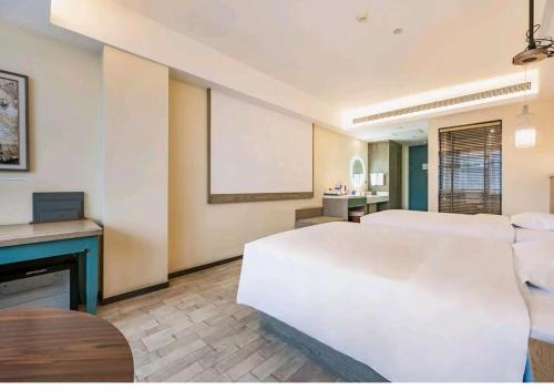 Imagen de la habitación del Hotel Mehood Theater, Zhonglou Metro Station Huimin Street. Foto 18