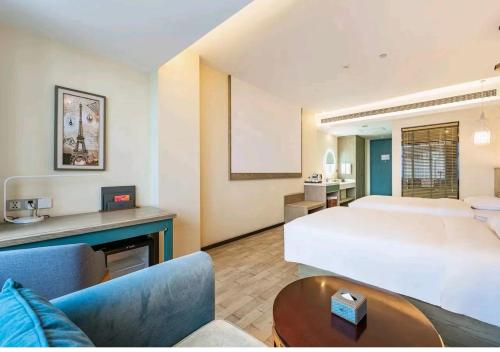 Imagen de la habitación del Hotel Mehood Theater, Zhonglou Metro Station Huimin Street. Foto 19
