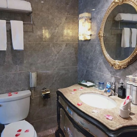 Imagen de la habitación del Hotel Mehood Tianjin. Foto 5