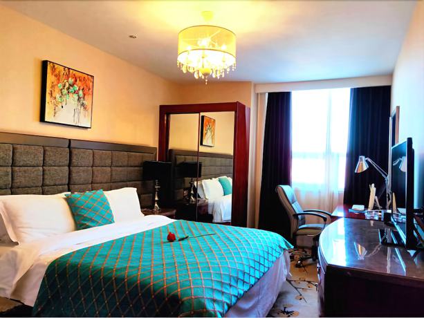 Imagen de la habitación del Hotel Mehood Tianjin. Foto 8