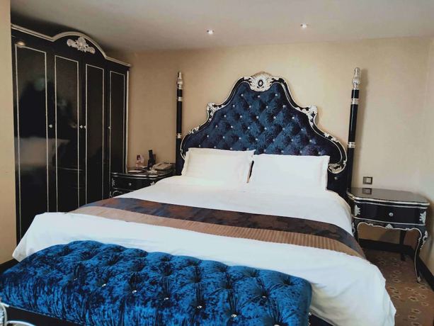 Imagen de la habitación del Hotel Mehood Tianjin. Foto 13