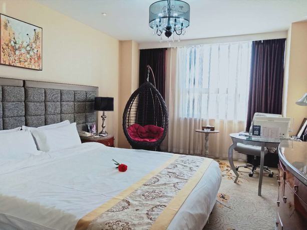 Imagen de la habitación del Hotel Mehood Tianjin. Foto 14