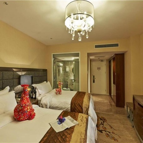 Imagen de la habitación del Hotel Mehood Tianjin. Foto 15