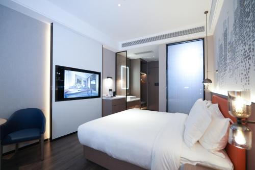 Imagen general del Hotel Mehood Xi\'an High-tech Software New City International Conference Center. Foto 2