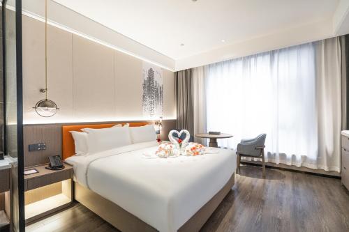 Imagen general del Hotel Mehood Xi\'an High-tech Software New City International Conference Center. Foto 10