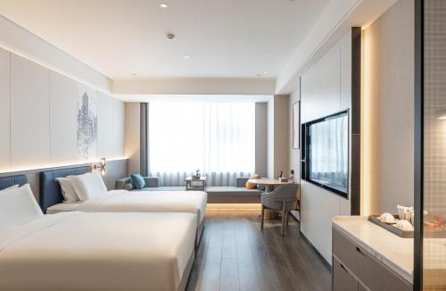 Imagen de la habitación del Hotel Mehood Xi\'an High-tech Software New City International Conference Center. Foto 18