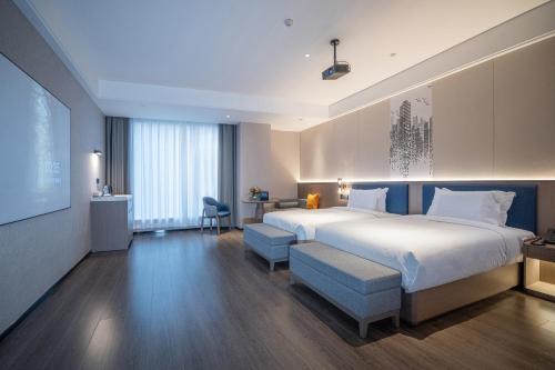 Imagen general del Hotel Mehood Xi\'an High-tech Software New City International Conference Center. Foto 13