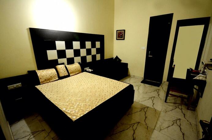Imagen de la habitación del Hotel Mehra Inn. Foto 14