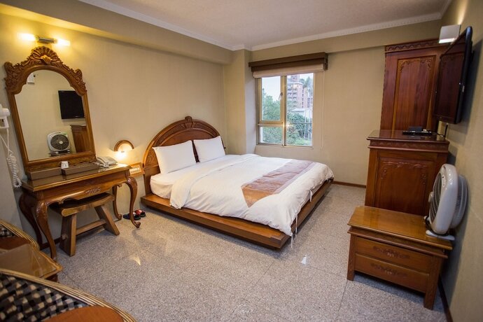 Imagen de la habitación del Hotel Mei Jia Mei. Foto 24
