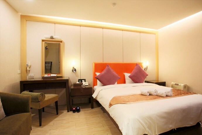 Imagen de la habitación del Hotel Mei Jia Mei. Foto 28