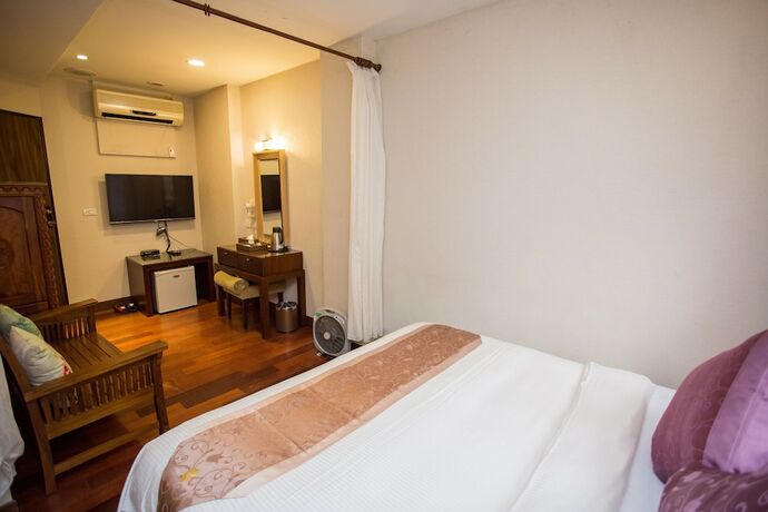 Imagen de la habitación del Hotel Mei Jia Mei. Foto 34