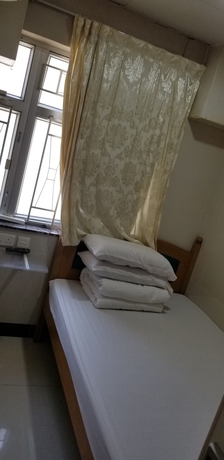 Imagen de la habitación del Hotel Mei Wah Guesthouse. Foto 3