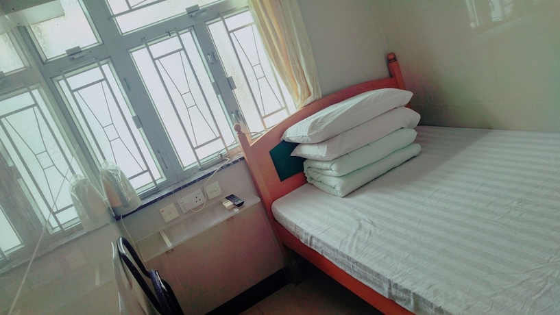 Imagen de la habitación del Hotel Mei Wah Guesthouse. Foto 4