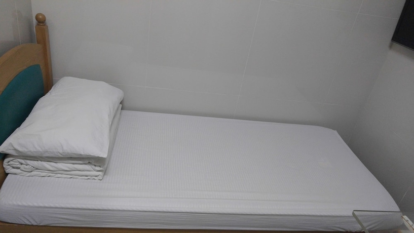 Imagen de la habitación del Hotel Mei Wah Guesthouse. Foto 6