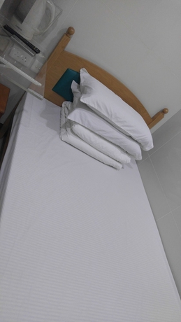 Imagen de la habitación del Hotel Mei Wah Guesthouse. Foto 9