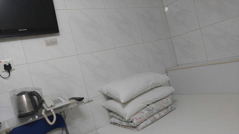 Imagen de la habitación del Hotel Mei Wah Guesthouse. Foto 10