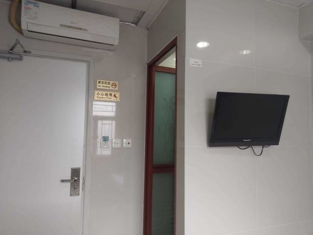 Imagen de la habitación del Hotel Mei Wah Guesthouse. Foto 12