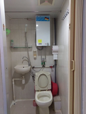 Imagen de la habitación del Hotel Mei Wah Guesthouse. Foto 13