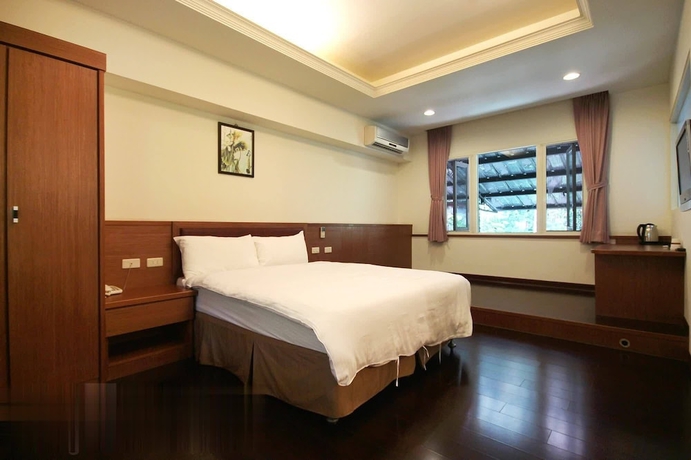 Imagen de la habitación del Hotel Mei Zhi Lin Holiday Homestay. Foto 2