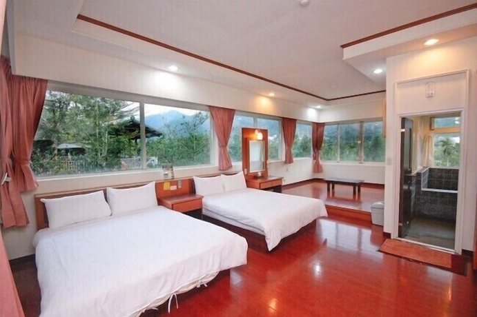 Imagen de la habitación del Hotel Mei Zhi Lin Holiday Homestay. Foto 7