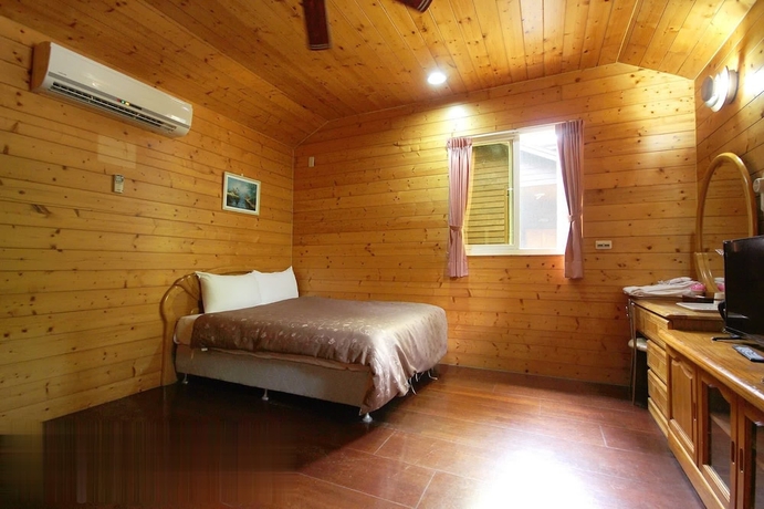 Imagen de la habitación del Hotel Mei Zhi Lin Holiday Homestay. Foto 8
